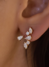 Load image into Gallery viewer, Close-up of an ear wearing a diamond earring with a dark background