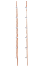 Load image into Gallery viewer, Pair of rose gold earrings with clear gemstones on a white background