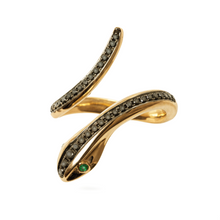 Load image into Gallery viewer, A gold-colored ring with a twisted design featuring small black and green stones.