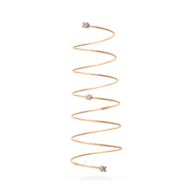 Load image into Gallery viewer, A gold-colored chain with multiple loops and small Charms, designed to be worn as body jewelry.