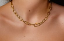 Load image into Gallery viewer, Gold chain necklace on a person's neck