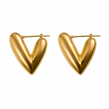 Load image into Gallery viewer, A pair of gold-colored hoop earrings with a smooth finish.
