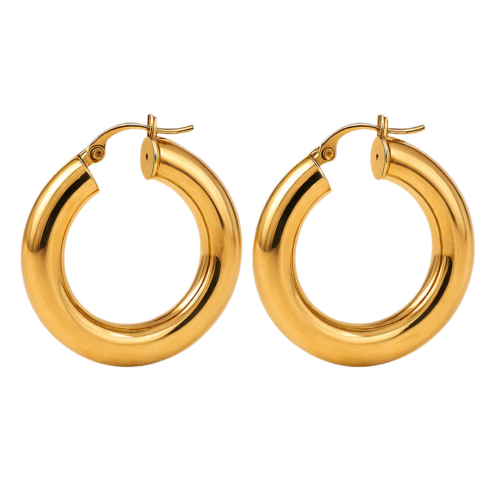 Gold hoop earrings on a white background