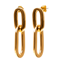 Load image into Gallery viewer, Gold hoop earrings on a white background
