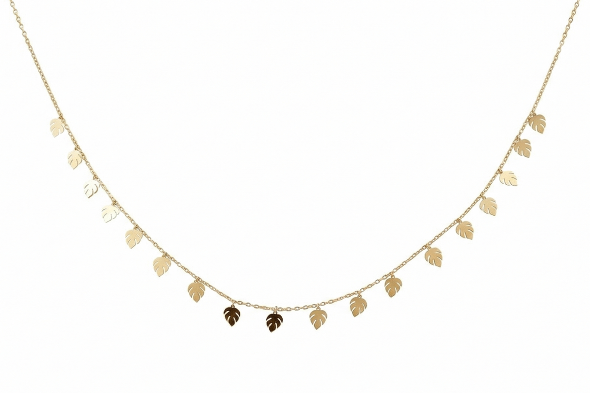 Gold necklace with leaf-shaped pendants on a white background
