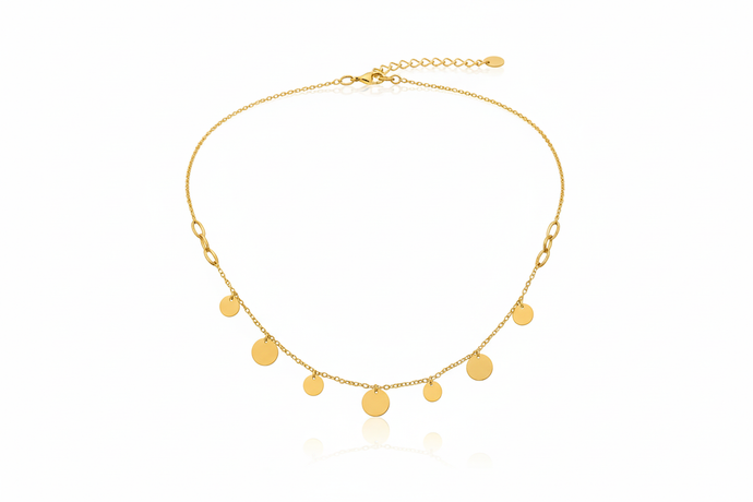 Gold necklace with round pendants on a white background
