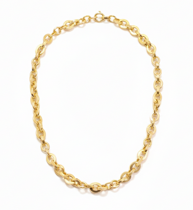 Gold chain bracelet on a white background