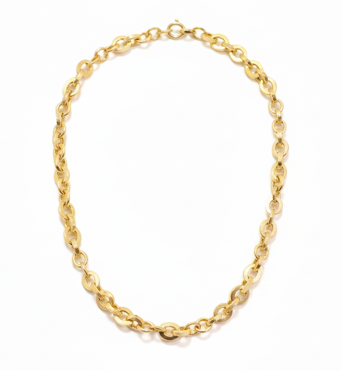 Gold chain bracelet on a white background