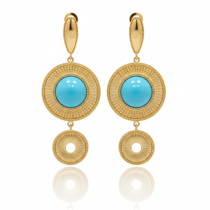 Gold earrings with turquoise stones on a white background