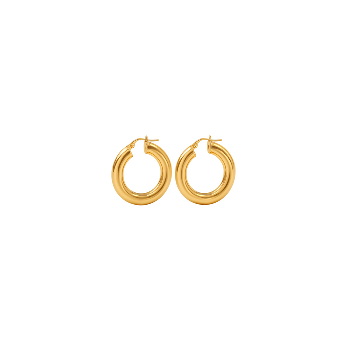 Pair of gold hoop earrings on a white background