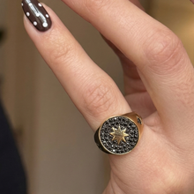 Load image into Gallery viewer, Hand with black and white polka dot nail design wearing a gold ring and bracelet.
